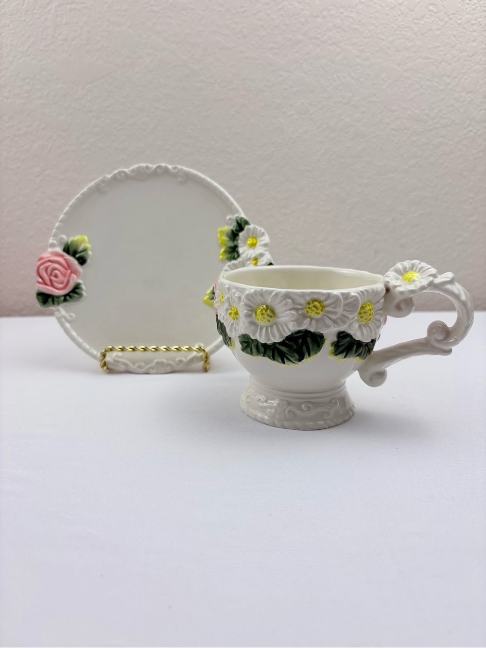 White Teacup & Saucer Featuring Ceramic Base, Raised White Daisies & Pink Roses